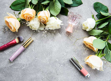 Roses and cosmetic - flat lay on a stone backgroundの写真素材