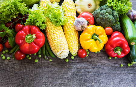 Set of vegetables on a old wooden  backgroundの写真素材