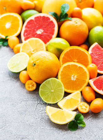 citrus fresh fruits on a concrete backgroundの写真素材