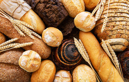 Assortment of baked bread as a food backgroundの写真素材
