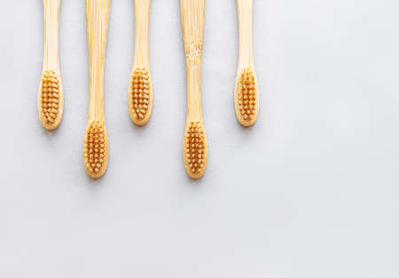 Bamboo toothbrushes on white background. Zero waste and use biodegradable and recyclable material...