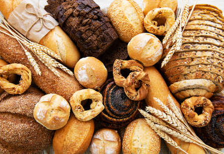 Assortment of baked bread as a food backgroundの写真素材