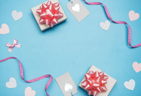 Valentine's Day background. Gifts, confetti on pastel blue background. Valentines day concept. Flat lay, top view, copy spaceの写真素材