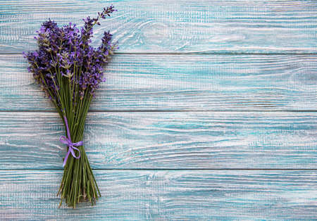 Fresh flowers of lavender bouquet on a white wooden backgroundの写真素材