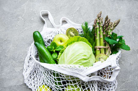 Healthy vegetarian food concept background, fresh green food selection for detox diet,  apple,...