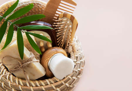 Zero waste natural cosmetics products on light brown background. Top view
