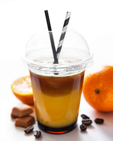 Orange and coffee cocktail on a white background