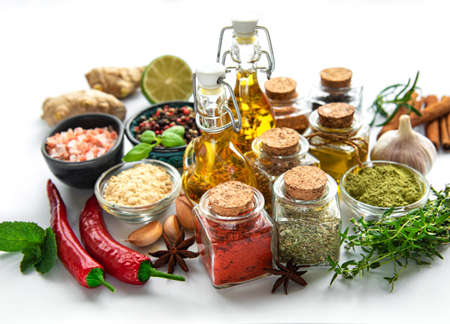 Various spices isolated on white background, top view