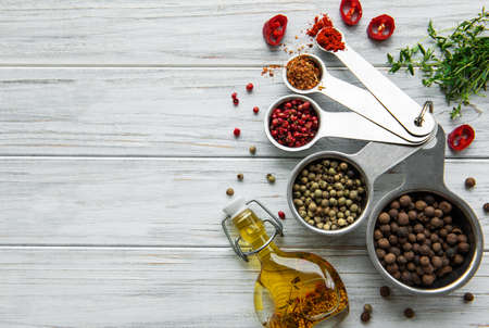 Various spices on white wooden background, top viewの写真素材