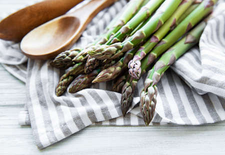 Fresh green asparagus on a white backgroundの写真素材