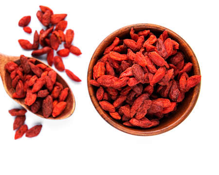Dry red goji berries for a healthy diet on a white background