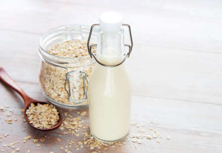 Vegan non dairy alternative milk. Oat flakes milkの写真素材
