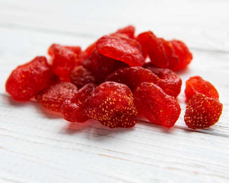 Dried Strawberries on a vintage wooden backgroundの写真素材