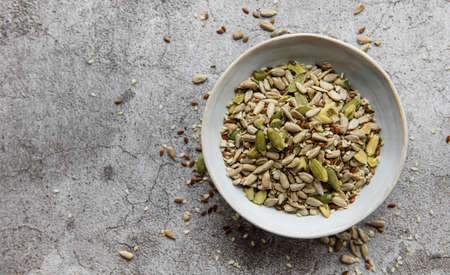 Mix different seeds for a healthy salad bowlの写真素材