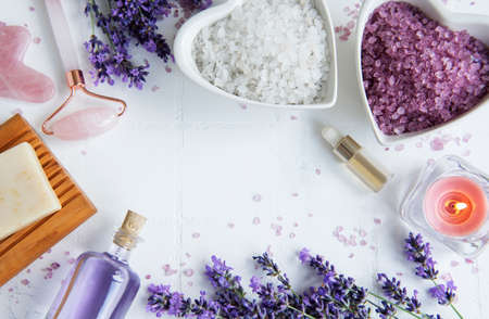 Lavender spa. Essential oils, sea salt and handmade soap. Natural herb cosmetic with lavender flowersの写真素材
