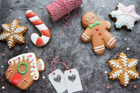 Christmas gingerbread cookies on a dark background. Homemade delicious Christmas gingerbread