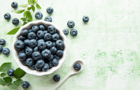 Freshly picked blueberries on a wooden background. Concept for healthy eatingの写真素材