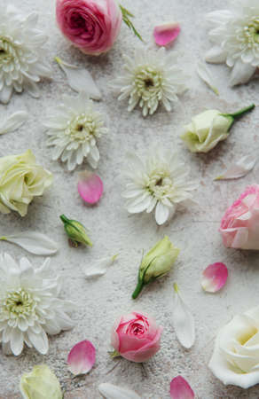 Pink and white flowers on concrete background.の写真素材