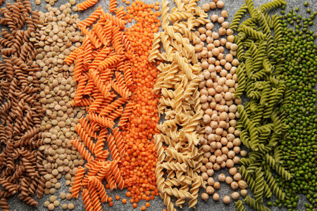 A variety of fusilli pasta made from different types of legumes, green and red lentils, mung beans...