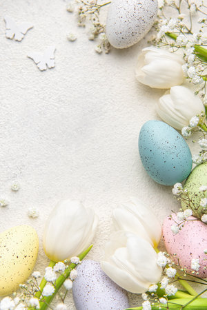 Happy Easter holiday greeting card. Bouquet of white tulips and Easter egg on concrete background. Space for textの写真素材