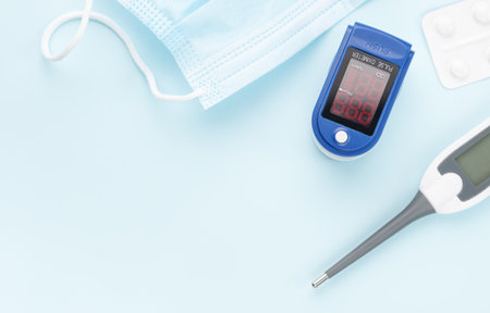Medical kit for the prevention and treatment of coronavirus. Mask, test, pulse oximeter and...
