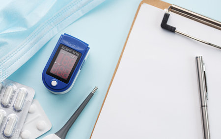 Medical kit for the prevention and treatment of coronavirus. Mask, test, pulse oximeter and...