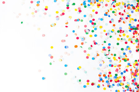 Colorful paper confetti on a  white backgroundの素材