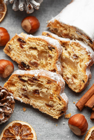 Traditional  stollen fruit cake. Christmas stollen with winter holidays decorationの写真素材