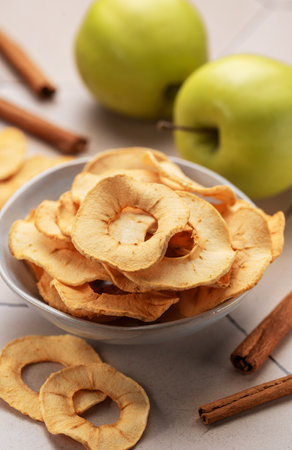 Dried apple chips. Dehydrated apples. Homemade dried organic apple sliced.の写真素材