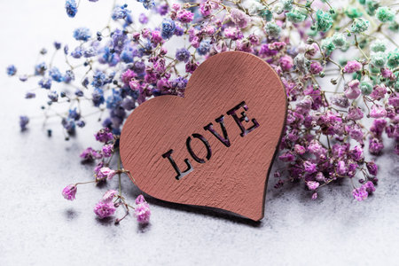 Heart and bouquet of beautiful  gypsophila. Valentines day concept.の写真素材