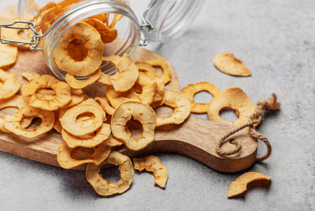 Dried apple chips. Dehydrated apples. Homemade dried organic apple sliced.の写真素材