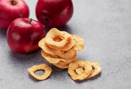 Dried apple chips. Dehydrated apples. Homemade dried organic apple sliced.の写真素材