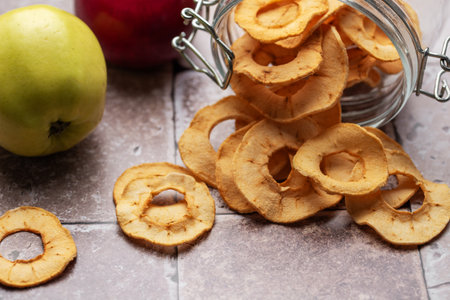 Dried apple chips. Dehydrated apples. Homemade dried organic apple sliced.の写真素材