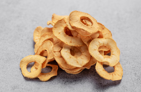Dried apple chips. Dehydrated apples. Homemade dried organic apple sliced.の写真素材