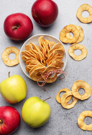 Dried apple chips. Dehydrated apples. Homemade dried organic apple sliced.の写真素材