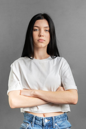 Portrait of a young teenager girl who looks sad.の写真素材