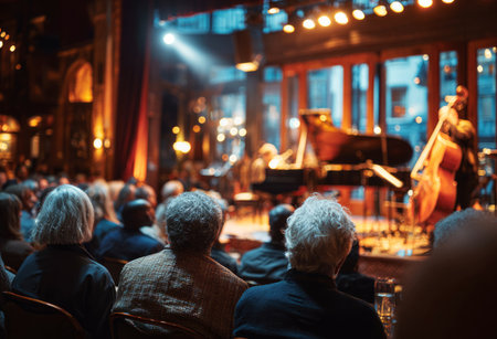 Audience enjoying live jazz music performance in a cozy clubの素材
