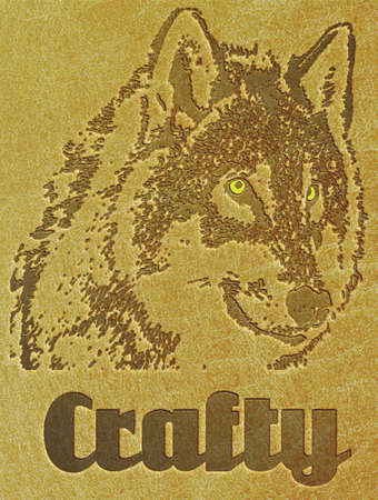 Wolf's head engraved on leather with the legend crafty.