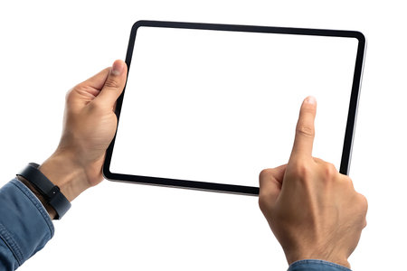 Man holding a tablet with a blank screen isolated on white backgroundの素材