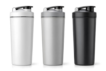Three protein shakers in different colors isolated on white backgroundの素材