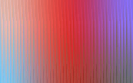 Abstract vertical stripes of soft red pink and blue gradient colors creating a gentle flowing and ethereal backgroundの写真素材