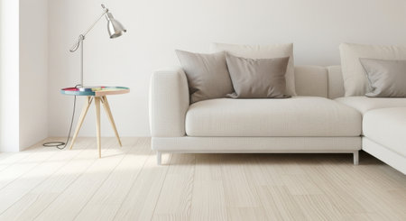 A bright and airy living room interior with a modern sofa and lamp. The room is decorated in a minimalist style with white walls and wooden floors. The furniture is simple.の素材