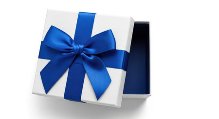 An open white gift box with a blue ribbon isolated on a white background. Perfect for any celebration or holiday. A beautiful and elegant way to present a gift.の素材