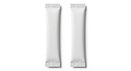 Two blank white stick sachets mockup on a white background. Perfect for showcasing your product packaging design. High-resolution image for professional use. Ideal for marketing materials.の素材