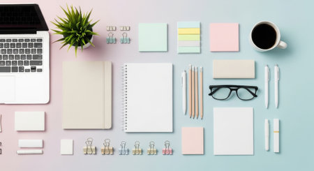 A creative flat lay of office supplies and a laptop on a pastel color background. The image includes a notebook, pen, pencil, paper, and other office essentials.の素材