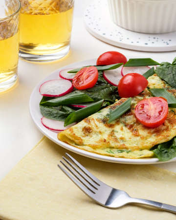 Brunch table. Homemade omelette spinach tacos Mexican foodの写真素材