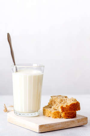 fermented baked milk on a wooden background