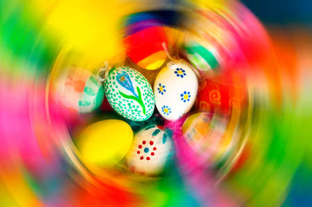 Traditional arrangement of easter eggs and easter feathersの写真素材