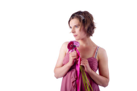 young woman with flower, copy space, white backgroundの写真素材