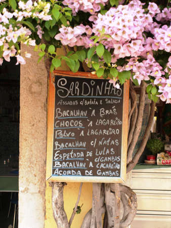 Food list under flowers in Lisbonの写真素材